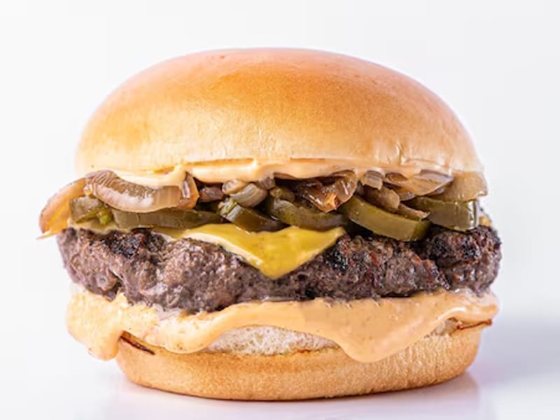 American Classic, Juicy beef patty with cheese slice, ketchup, mustard sauce and a fresh bun, Sufraq Karachi