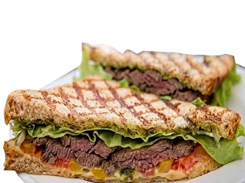 Beef Classic, Seasoned beef with spicy jalapeños, olives, fresh vegetables and a premium cheese slice in perfectly toasted layers, Sufraq Karachi