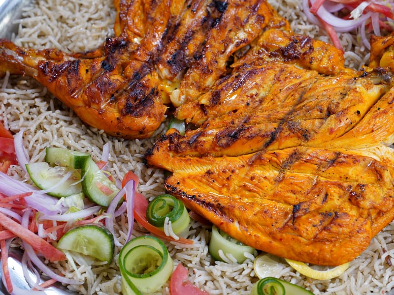 Classic Mandi, Rice topped with grilled chicken, veggies and sauces, Sufraq Karachi