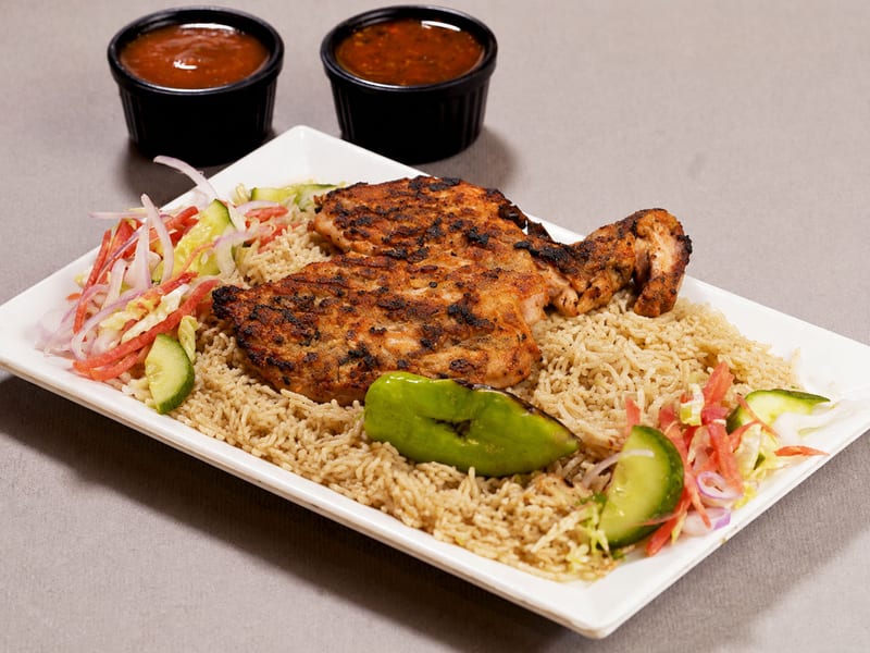 Malai Platter, Malai Tikka, Malai Boti, Shish Taouk Boti with 2 kebabs, served with rice, vegetables and sauces, Sufraq Karachi